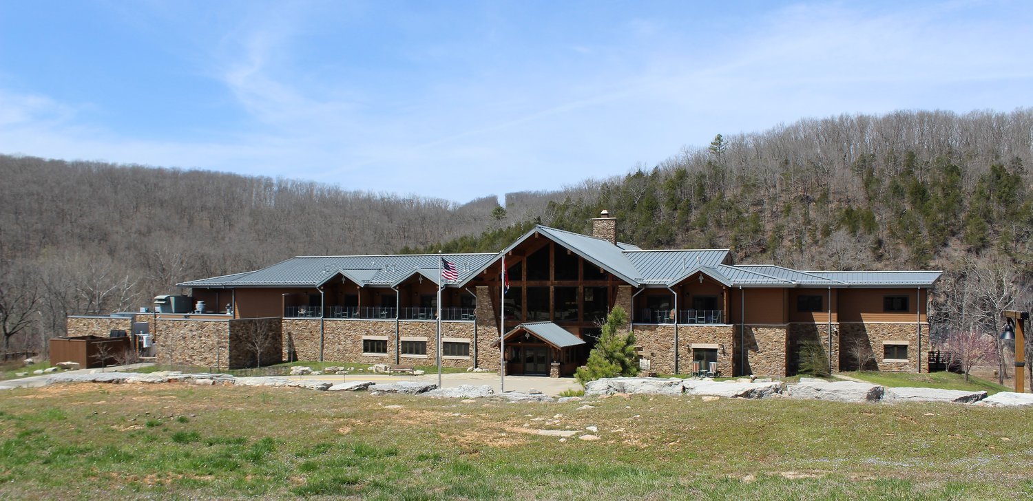 The iconic lodge at Echo Bluff State Park, shown in April, has guest rooms and indoor and outdoor casual dining for residents to enjoy while they fill their days hiking, swimming or fishing.
