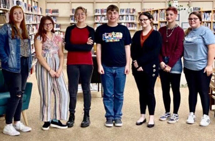 The staff of the award-winning 2021-2022 Ridgerunner folklore magazine, from left: Emma Murray, Editor Hailie Mongillo, Annabelle Yarnell, Seth Roush, Autumn Collins, Charlie Lockhart and Larmey Head. Brandon Strawn and Max Guilliams were also on the staff.