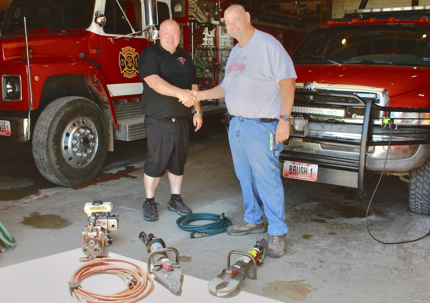 Last Sunday, the Eastern Douglas County Volunteer Fire Department welcomed Deputy Chief Gary Larrow of the Pecatonica, Ill., Fire Department. Larrow, left, was in the area to visit family members and made a special stop by EDCVFD to bring a donation, Public Information Officer Kathy Gifford with the local fire department. Items donated were newer, more compact extrication tools, consisting of a combination cutter/splitter, cutter, hoses and a compressor. Commonly known as " The Jaws of Life,’’ Gifford explained, the tools are crucial in the event of motor vehicle accidents. “We at Eastern Douglas are so grateful for this generous donation, and would like to thank Deputy Chief Larrow and the Pecatonica Fire Department for their generosity,” said Gifford. “Donations such as these provide the department with the tools necessary for us to be more effective and efficient in serving our community." Receiving the donation on behalf of the fire department is EDCFVD Chief Chris Hammett.