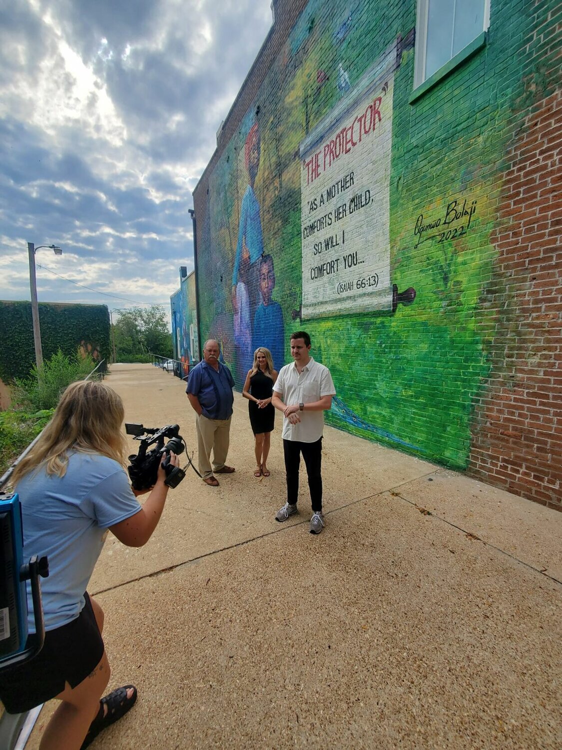 The KOLR10 Ozarks Live crew took a tour of West Plains Murals, stopping to admire artwork painted on walls throughout the city. Here, the show’s personalities, Tom Trtan, left, Cami Jenkins, Center, and Blake Haynes, are filmed in front of “The Protector” on the north wall of 14 Court Square, in Luyster Arcade. To experience the tour, visit explorewestplains.com/mural-tour for a map of mural locations.