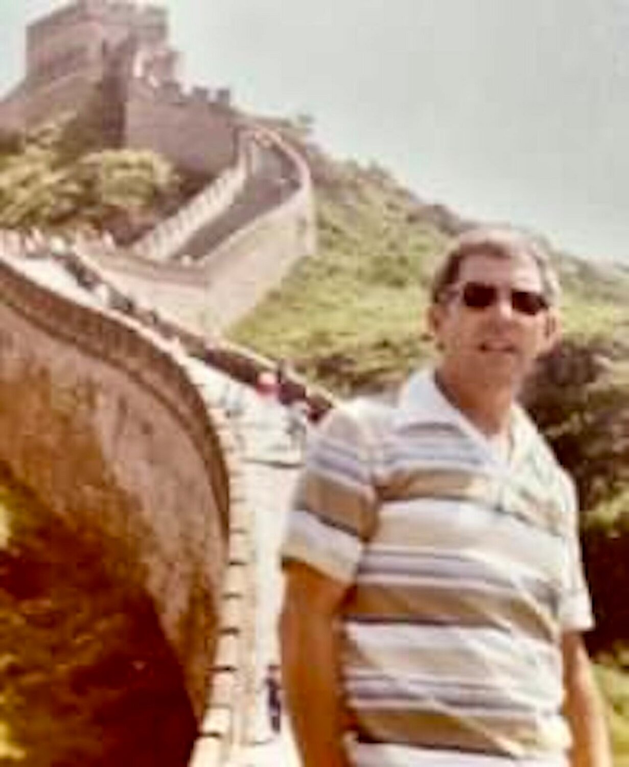 Bill standing on The Great Wall of China.
