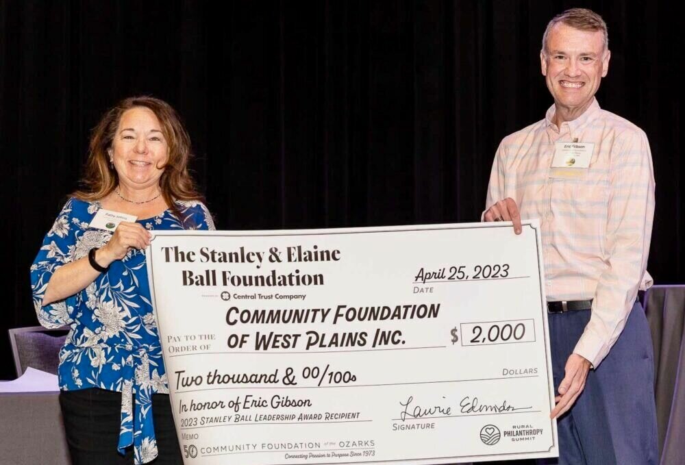 Eric Gibson, right, president of the Community Foundation of West Plains, was selected for the 2023 Stanley Ball Leadership Award. In Gibson’s honor, the CFWP received a $2,000 grant.