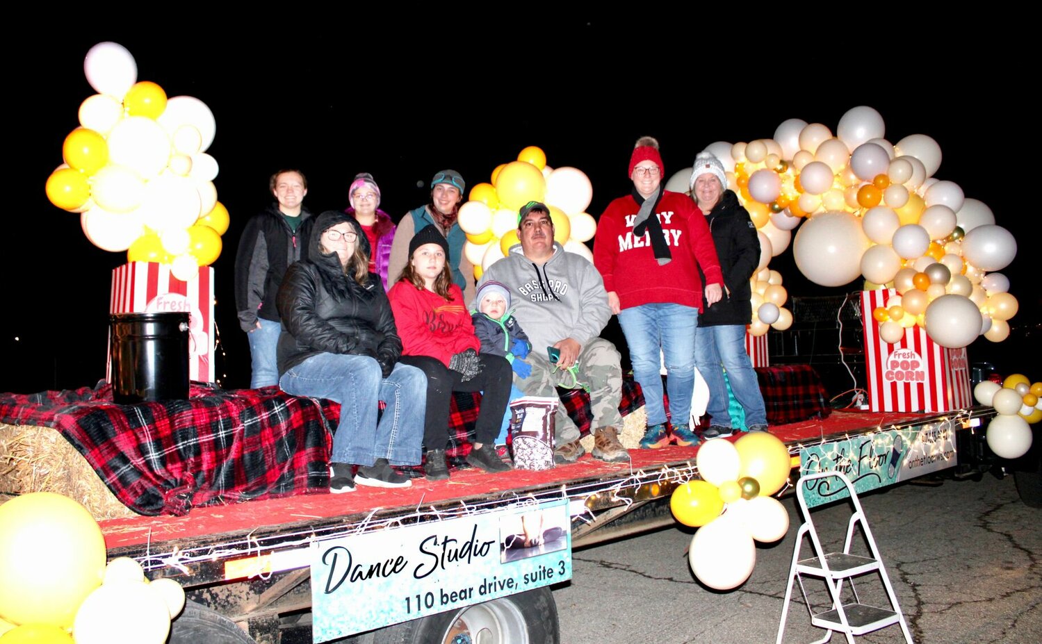 "Christmas at the Movies" was well-represented by this first-prize-winning float entered by Bear Crossing Truck Wash and Tire Center, Coastal-FMC and On the Floor Dance Studio. It features oversized popcorn containers, balloon arches and a snow machine. The parade, held Saturday, was organized by the Willow Springs Chamber of Commerce.